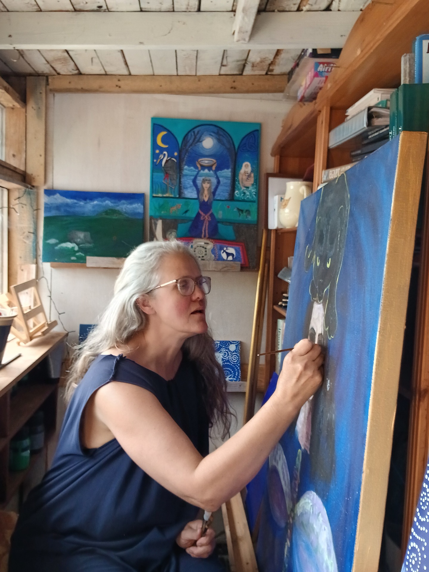 Sandra Nelson Irish Artist studio, large canvas, commissioned, indigo blue background, 